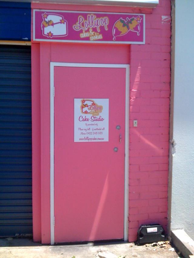 Behind the pink door