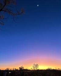 Sunset, moonrise. 